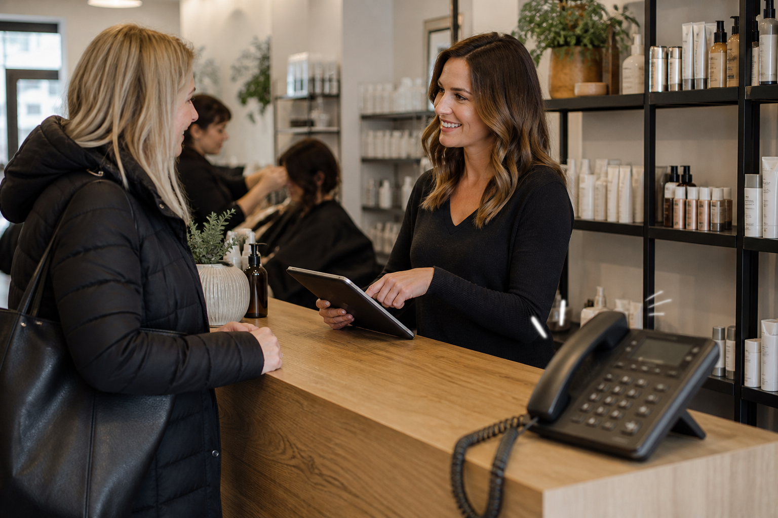 Busy small-business reception comparing live call cover and an AI Assistant handover